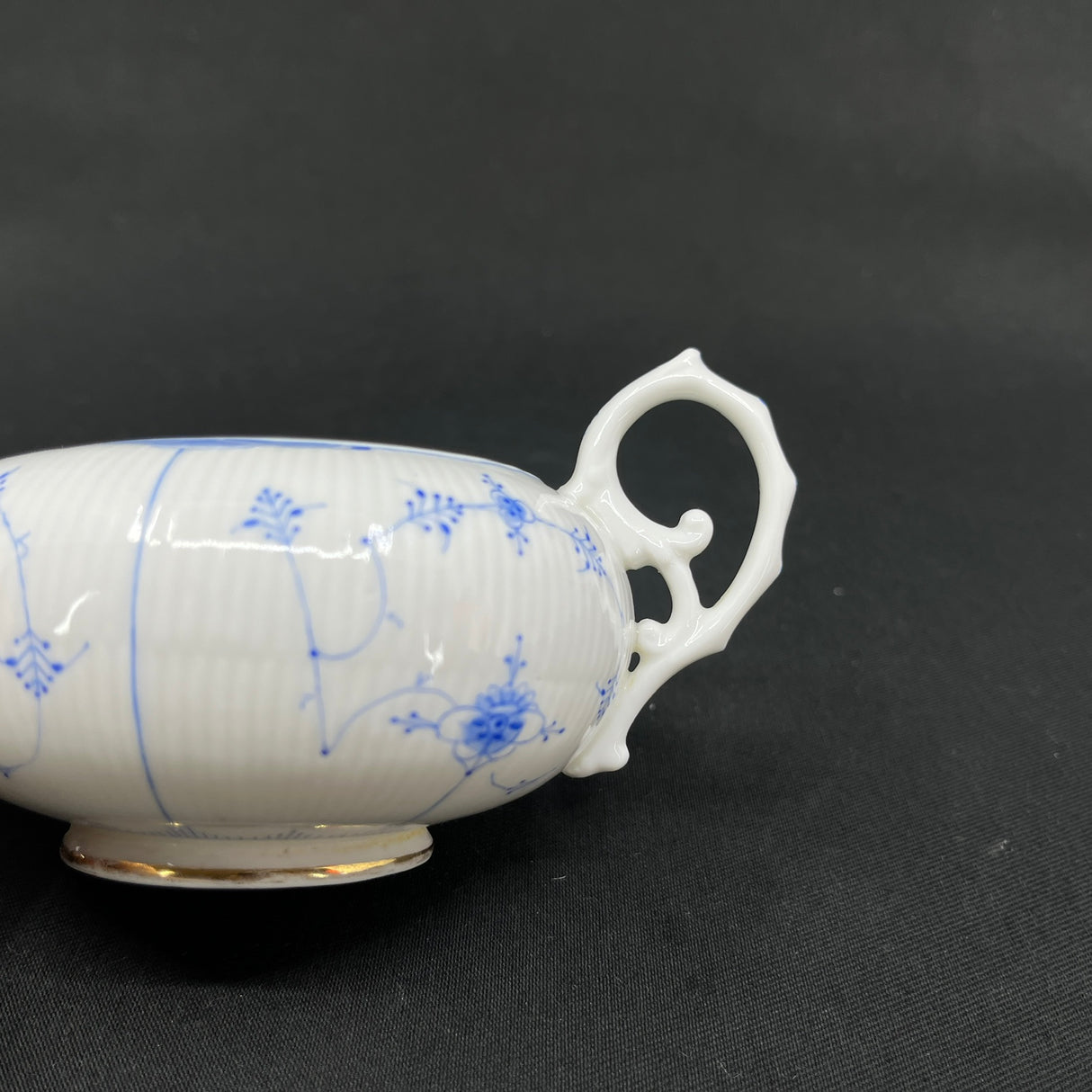 Rare Blue Fluted creamer from Bing & Grøndahl with gold trim.