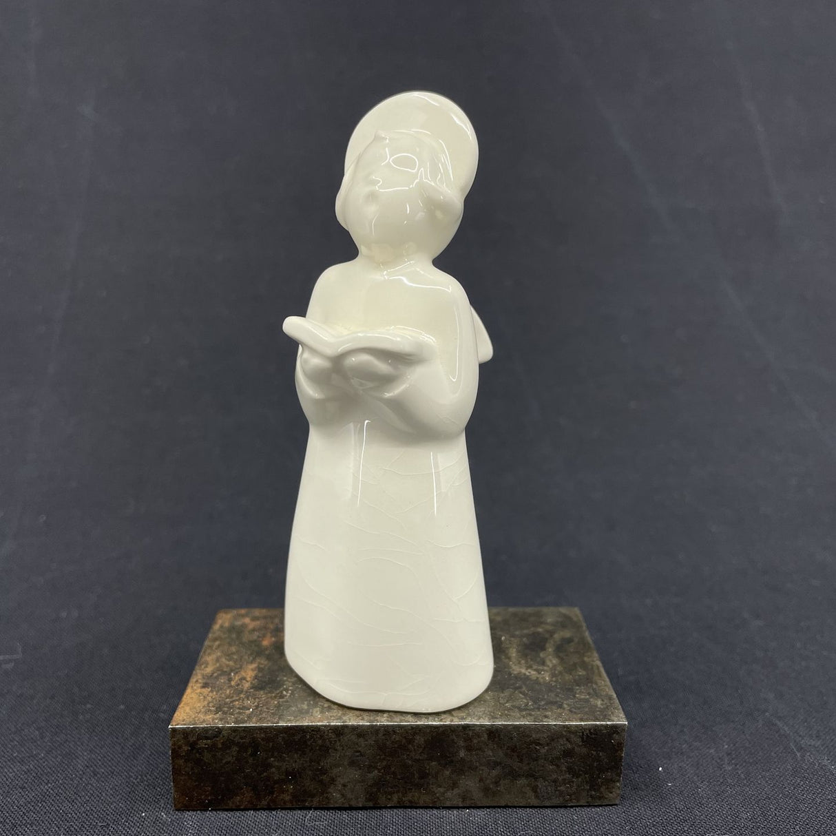 Angel with hymn book