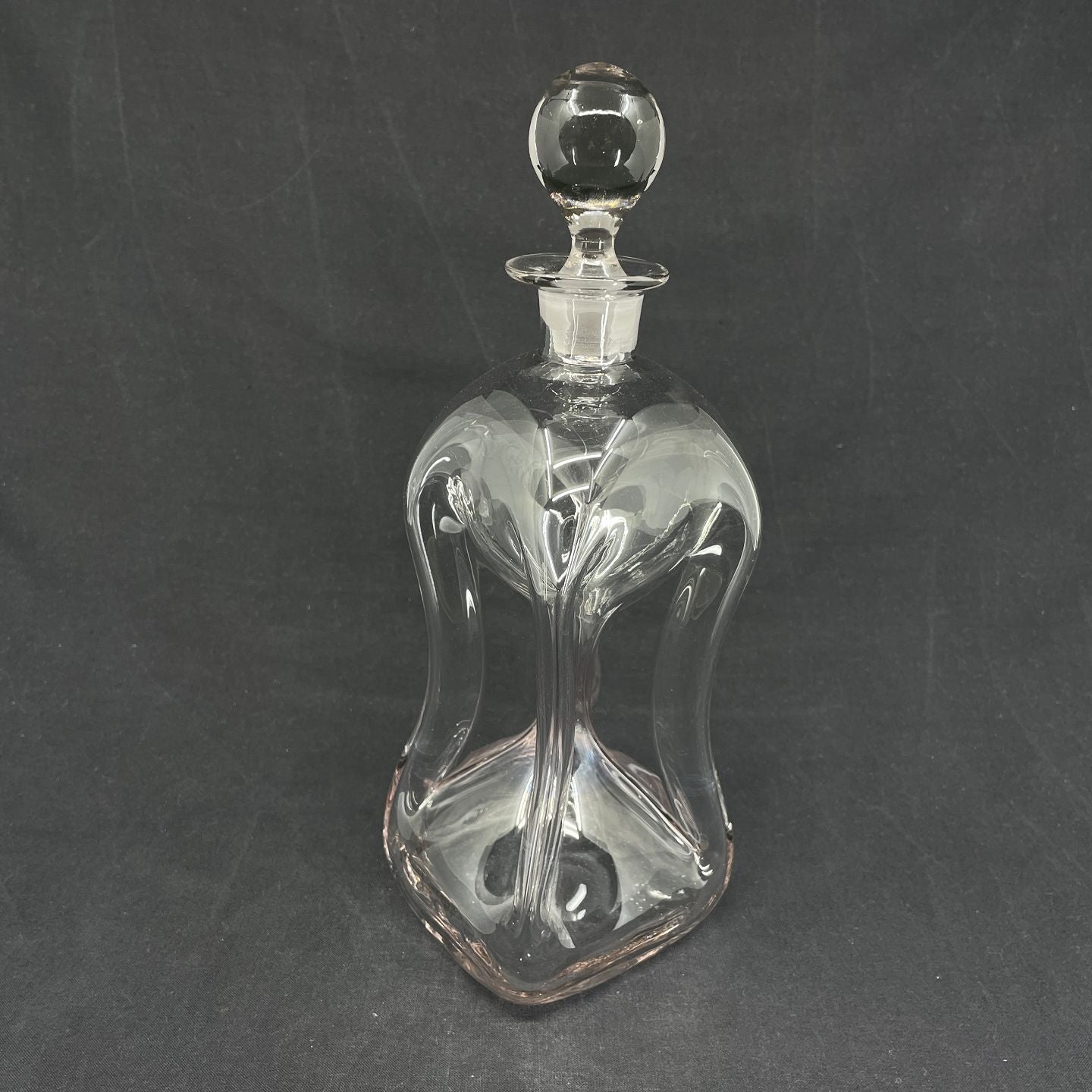 Faintly manganese-coloured clucking bottle from Holmegaard