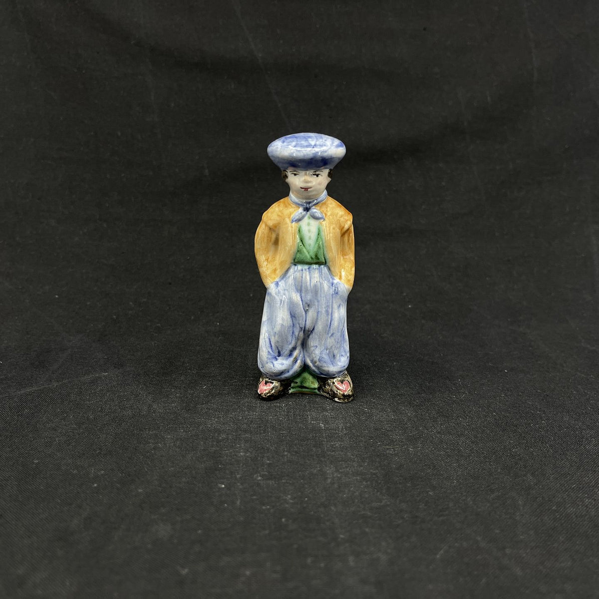 Local figure from L. Hjorth, man with blue hat