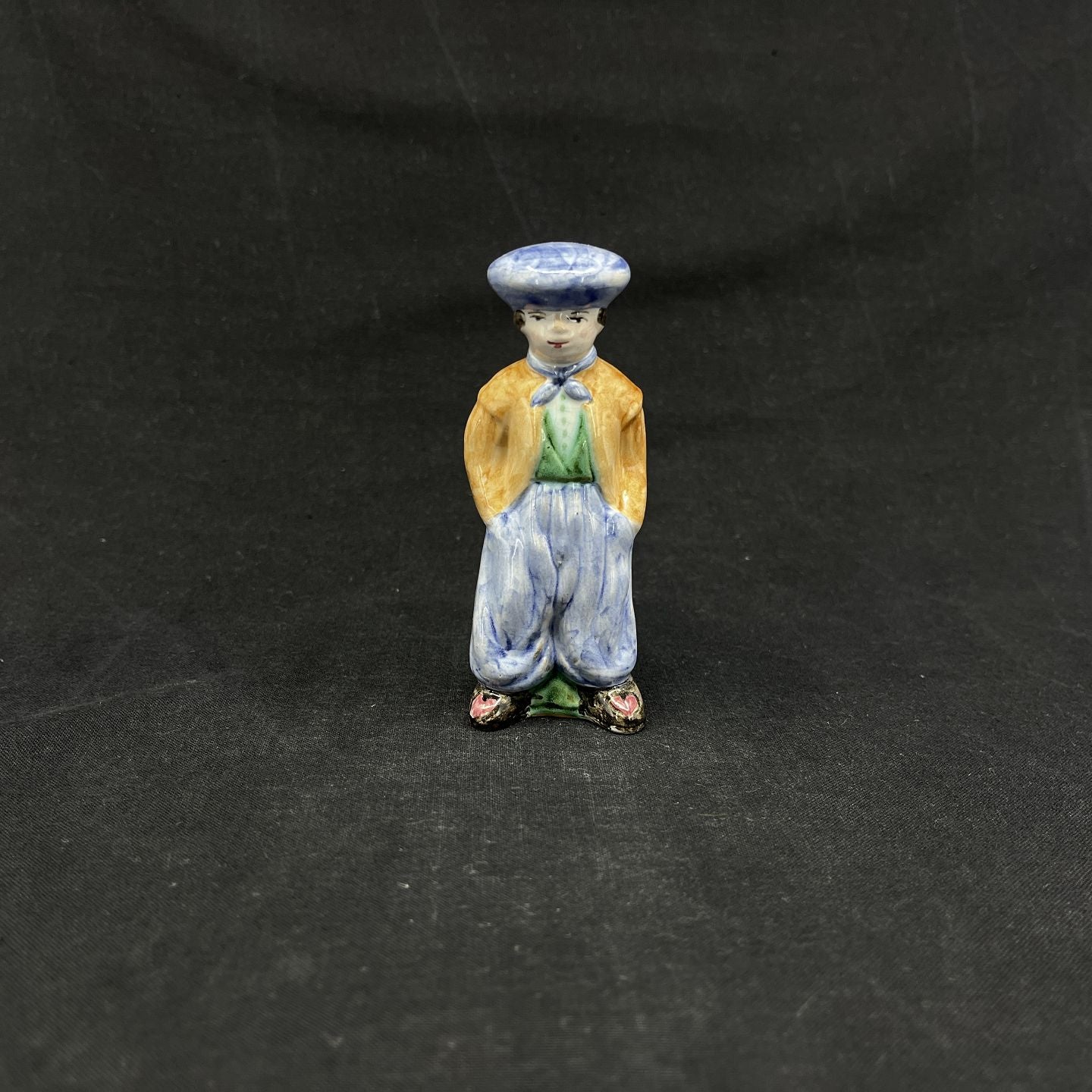 Local figure from L. Hjorth, man with blue hat