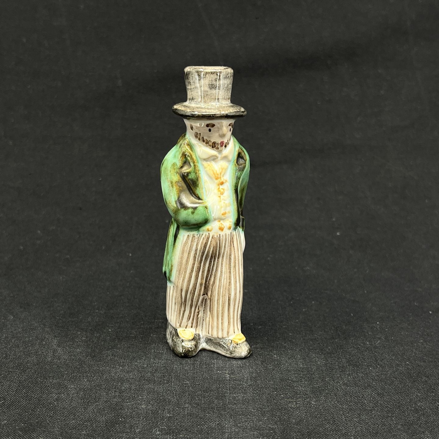 Local figure from L. Hjorth, man with hat