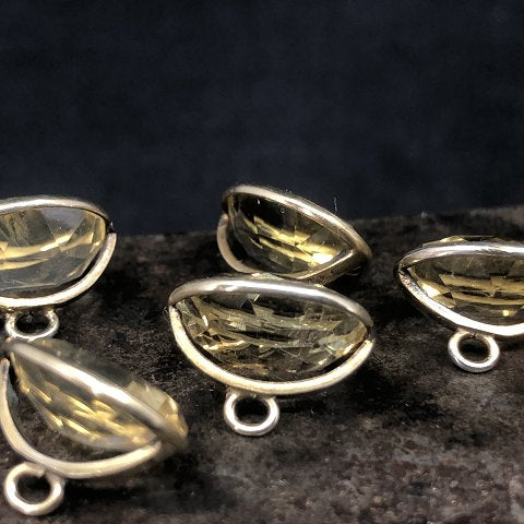 Knapper med citrin og forgyldt sølv