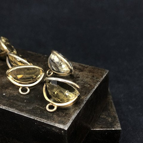 Knapper med citrin og forgyldt sølv