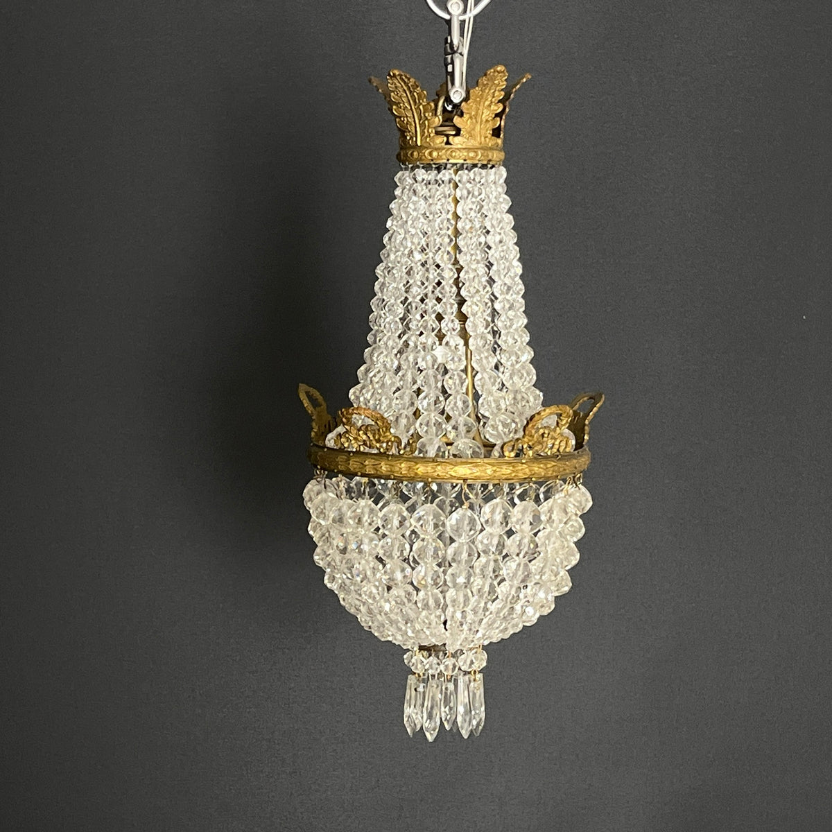 Unusually small prism chandelier – pearls on a string