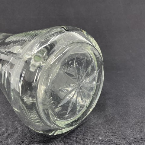 Fine glass jug with many cuts