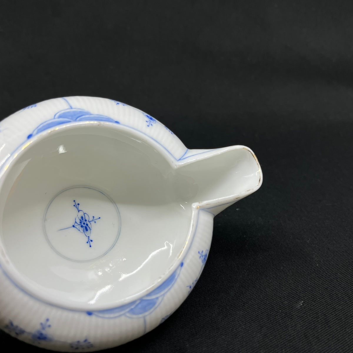 Rare Blue Fluted creamer from Bing & Grøndahl with gold trim.