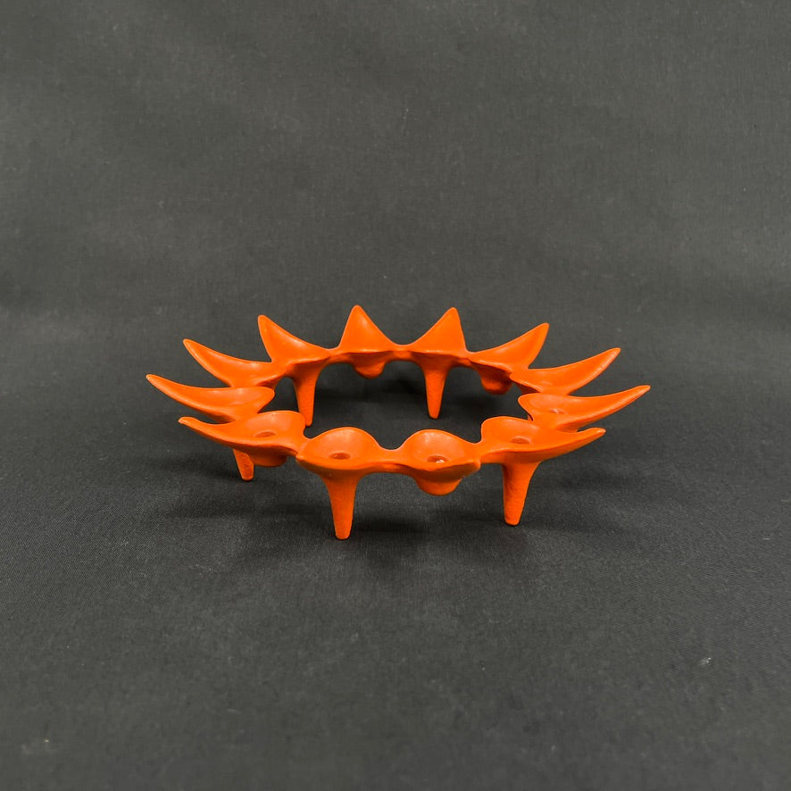 Orange lysestage af Jens Harald Quistgaard