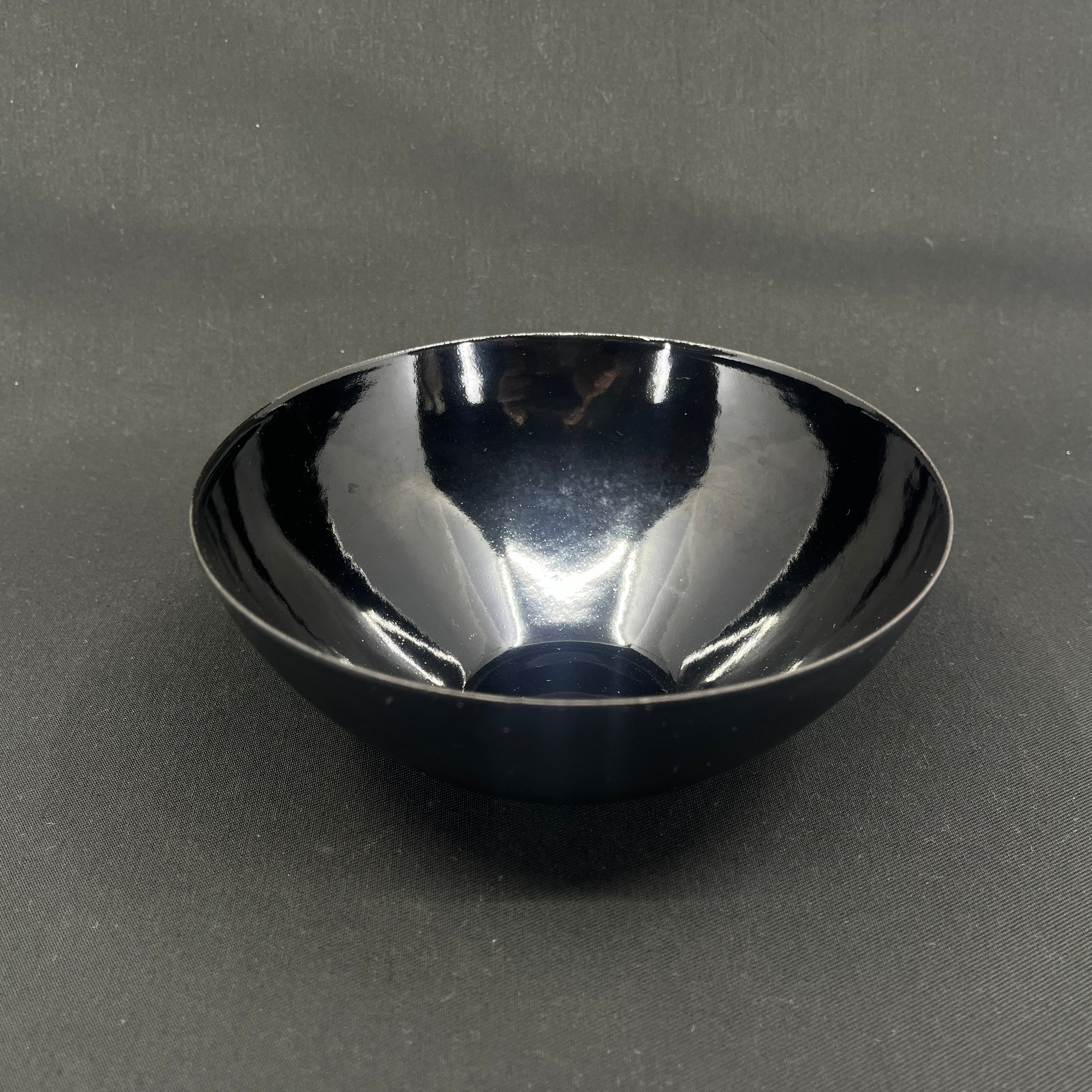 Black crenite bowl, 16 cm.