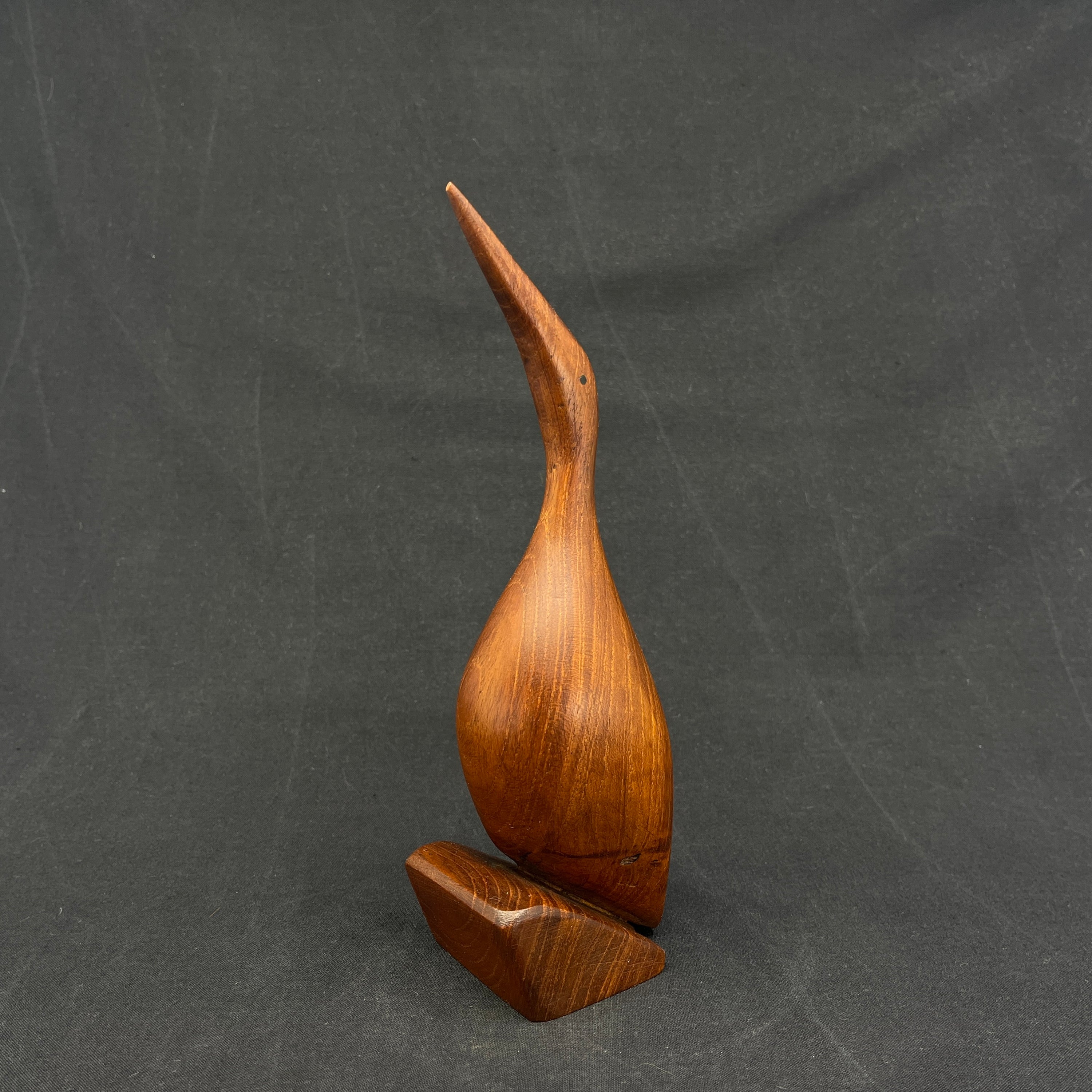 Teak wood figurine - bird with black eyes