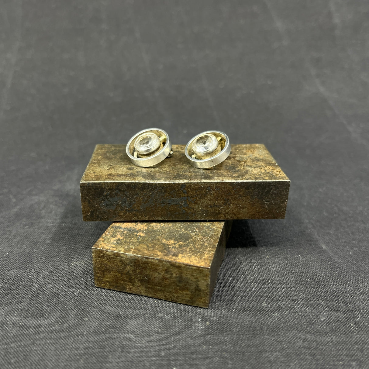 A pair of ear clips by N. E. From