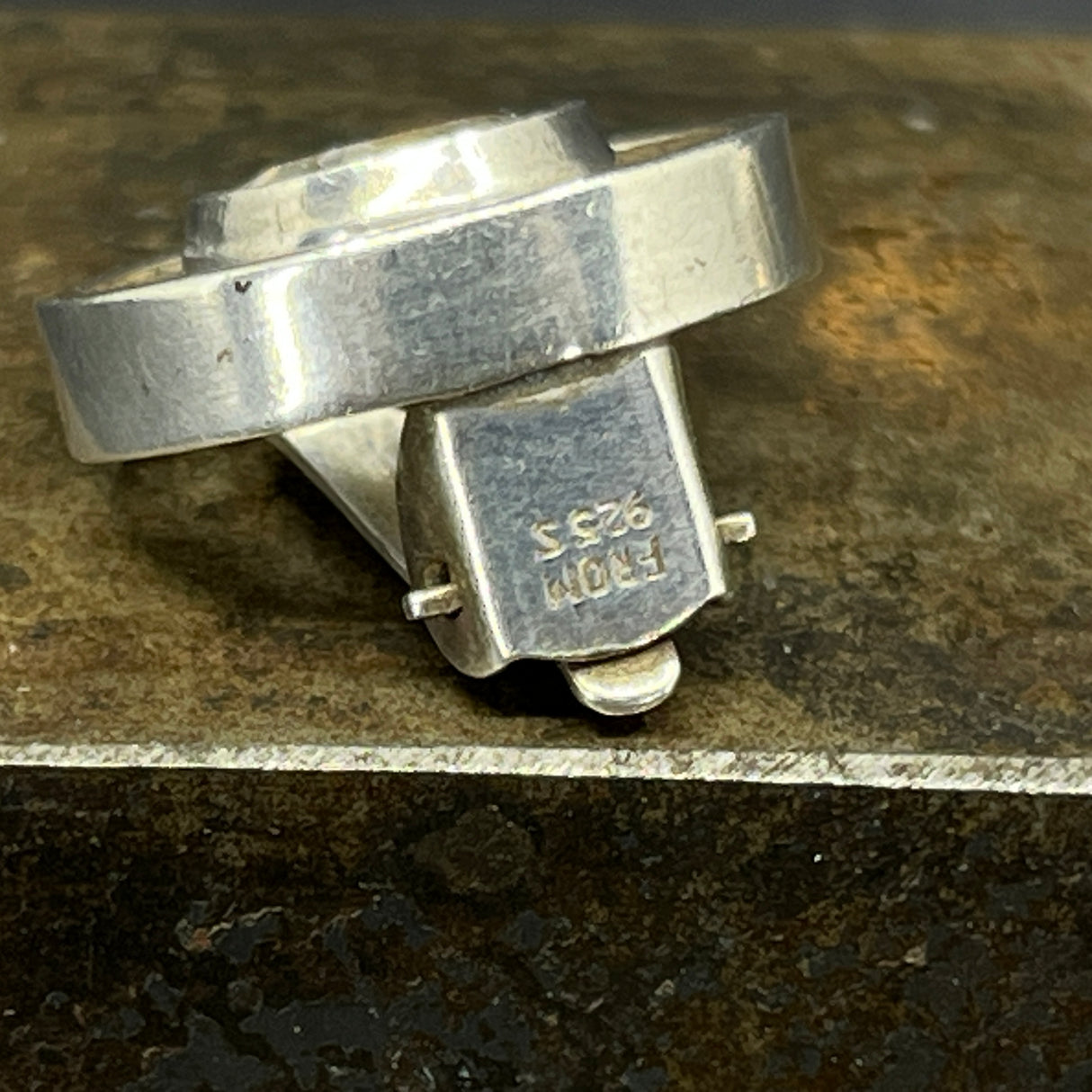 A pair of ear clips by N. E. From