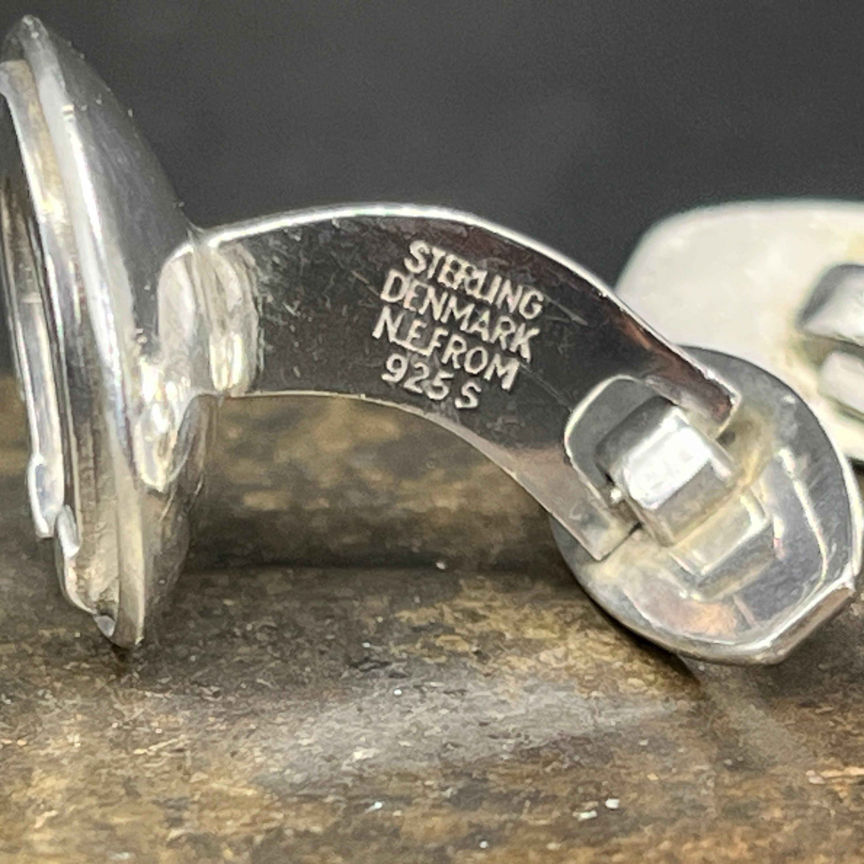 Et par N. E. From manchetknapper - hestesko