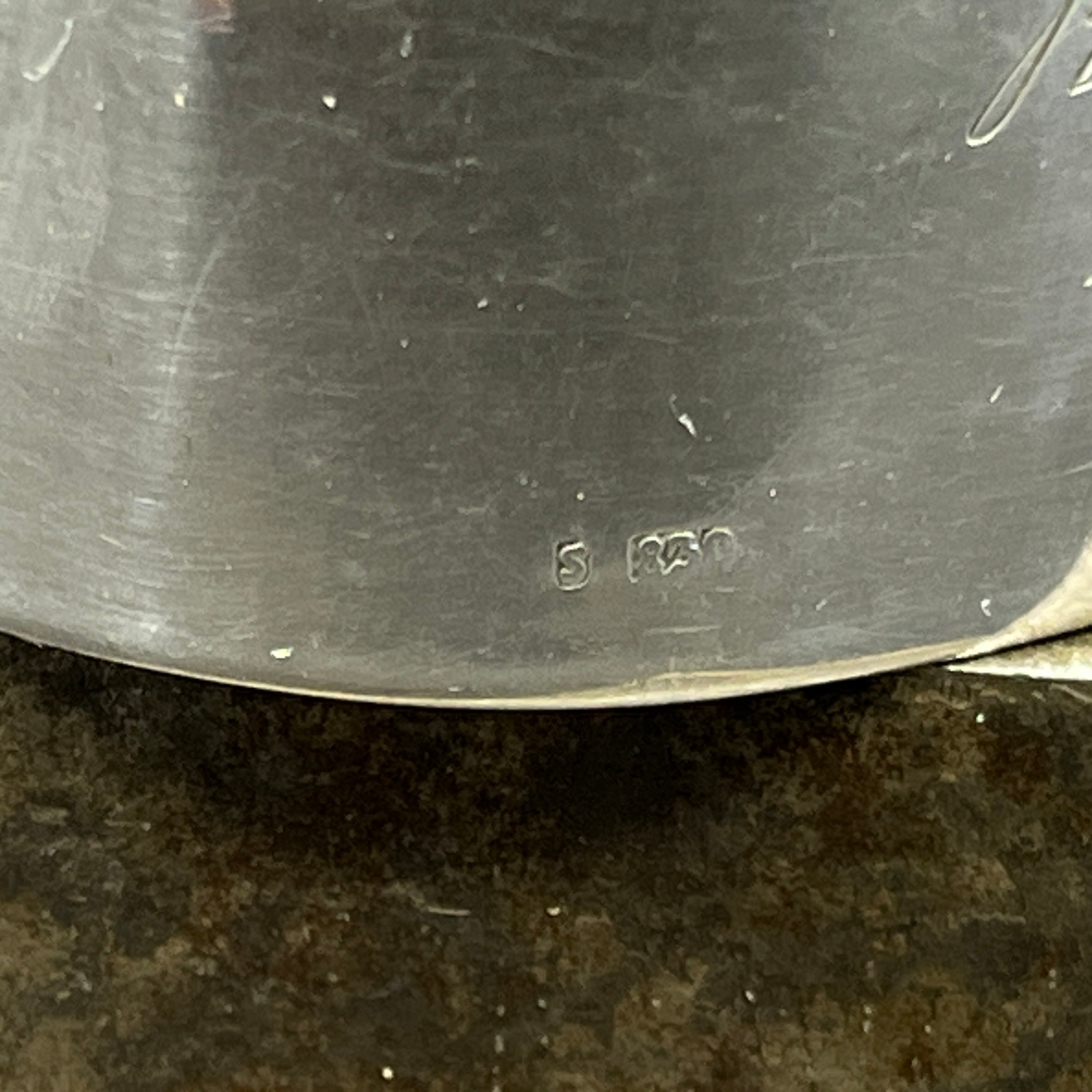 Wide art deco napkin ring in silver with flowers