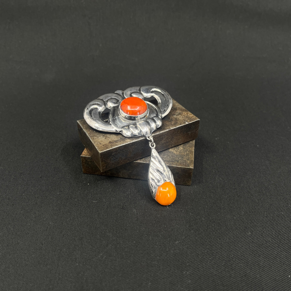 Large fine wood brooch with amber