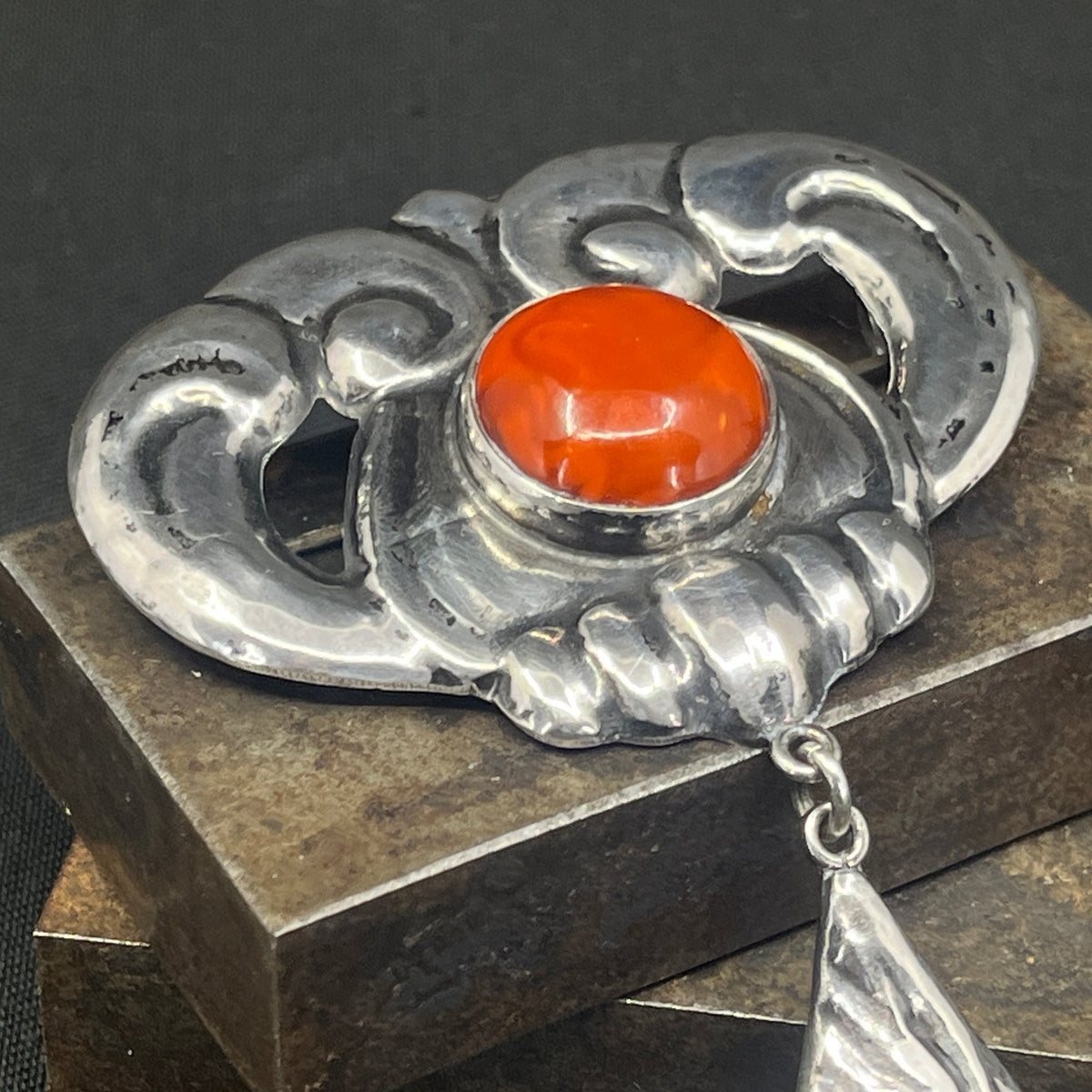 Large fine wood brooch with amber