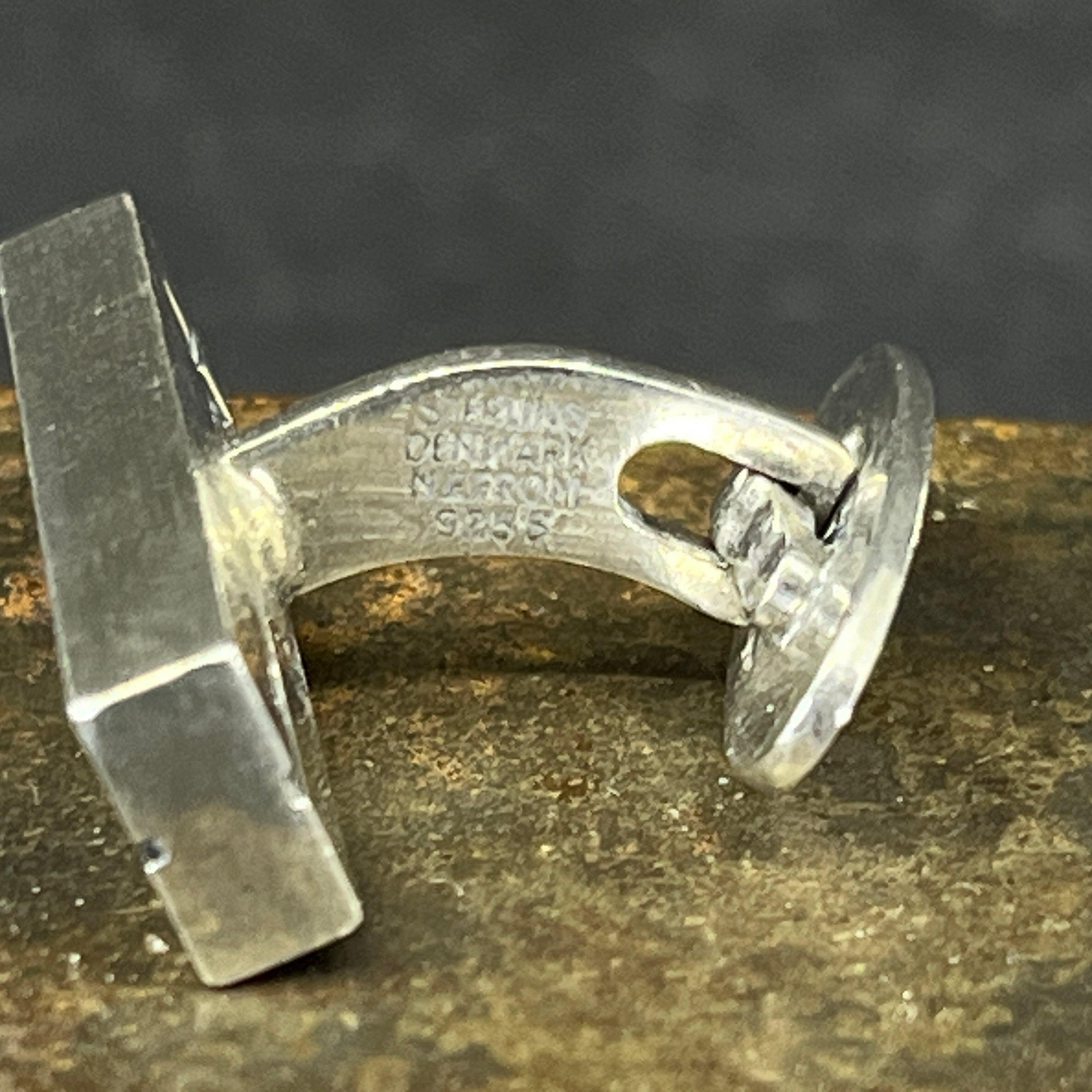 A pair of NE From cufflinks