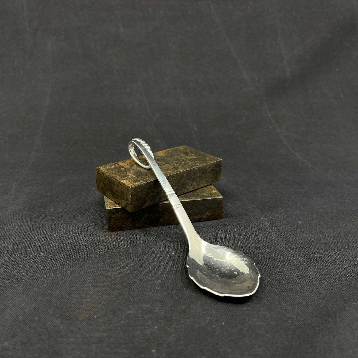 Ornamental spoon from Georg Jensen, 12 cm.