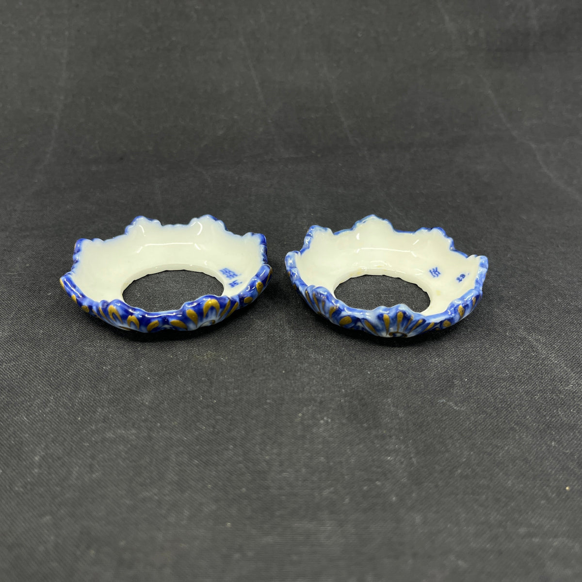 A pair of Blue Fluted light cuffs with gold