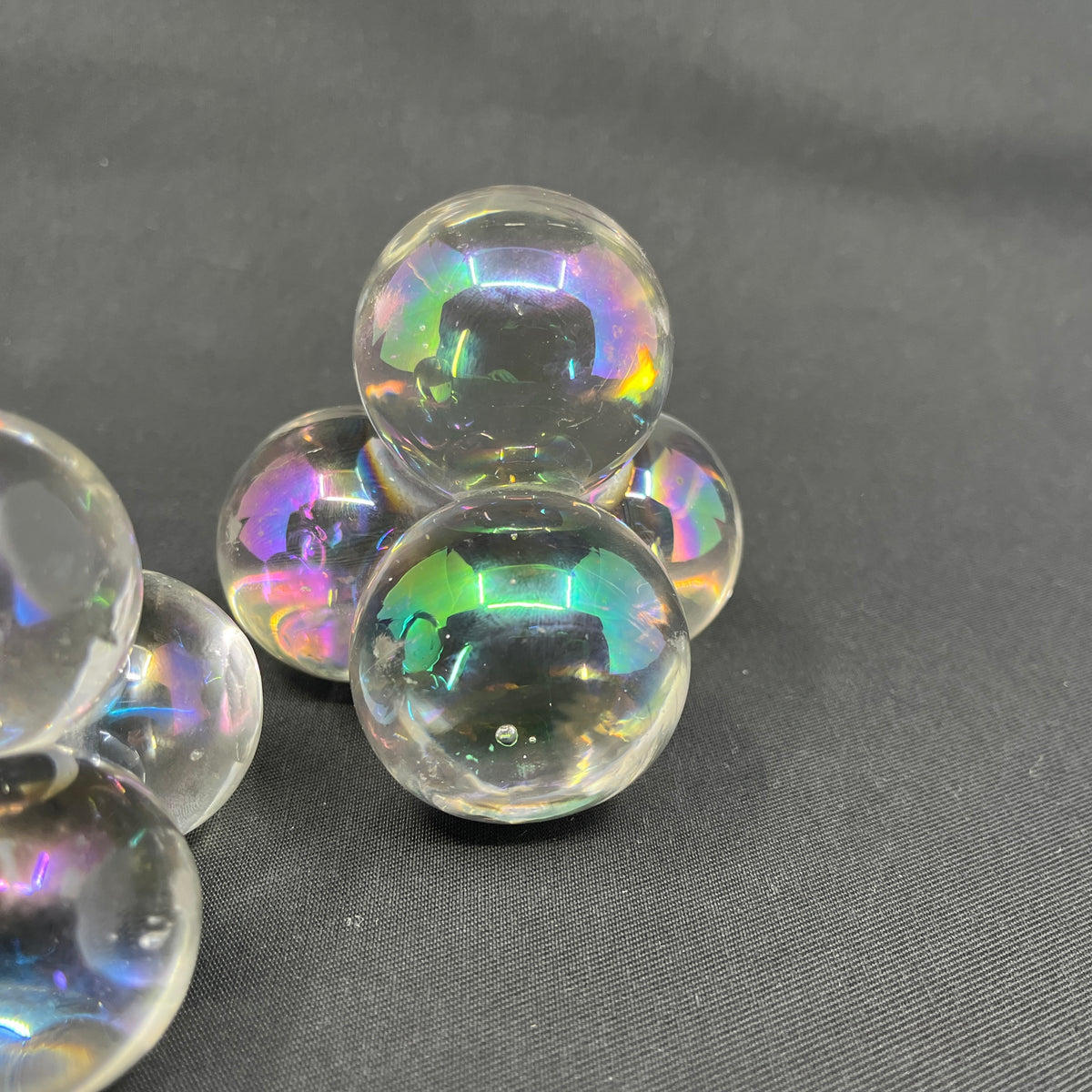 A pair of quirky glass paperweights