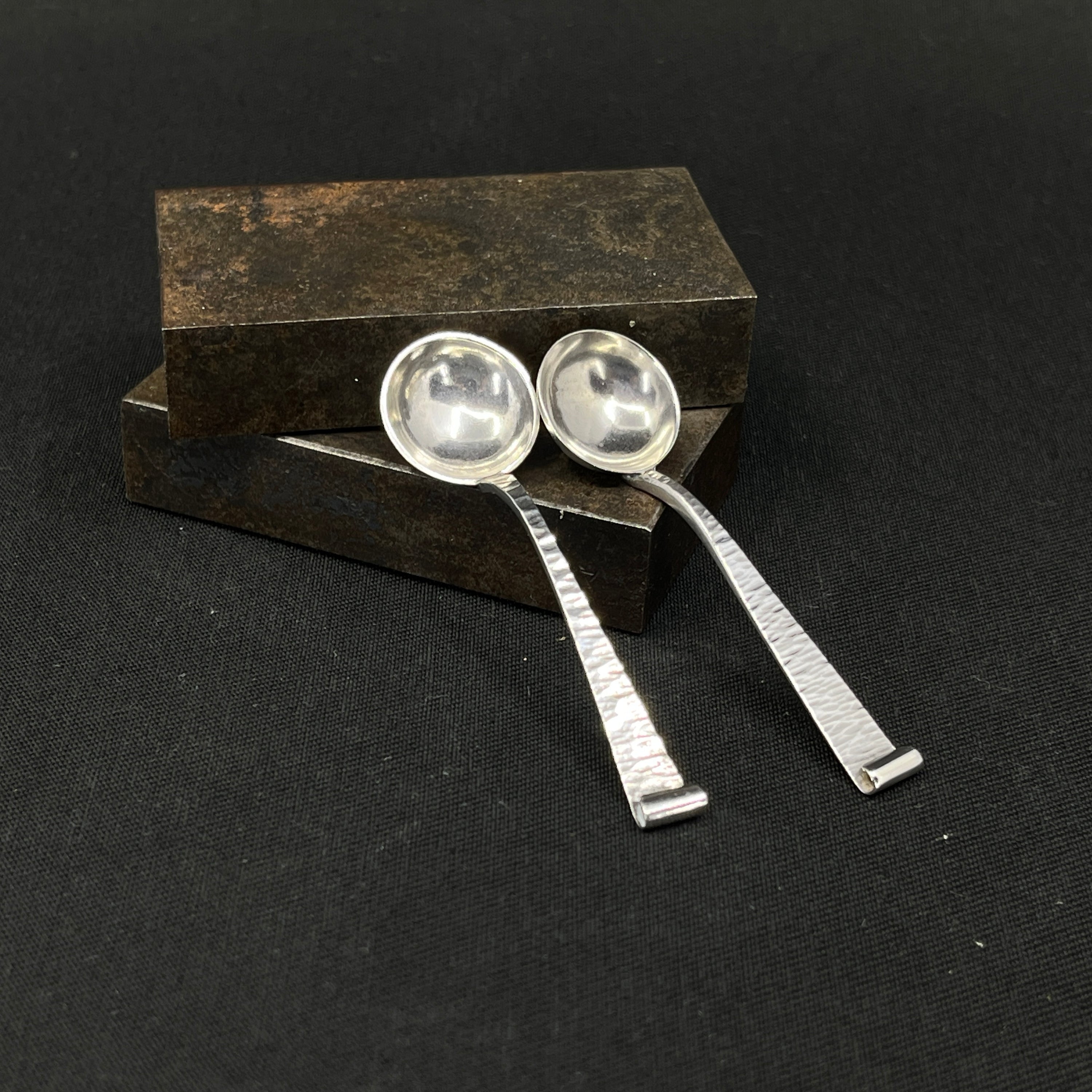 A pair of silver salt spoons from 1884