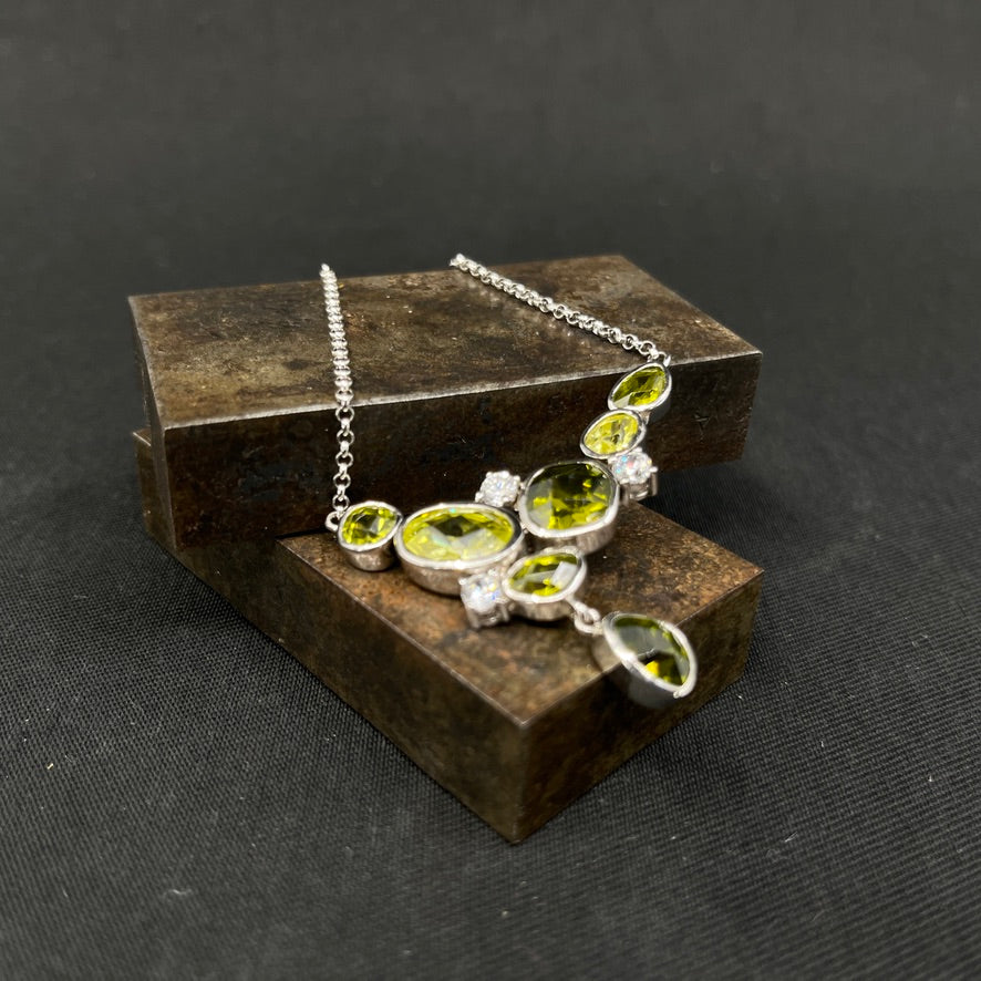 Necklace in silver with green stones
