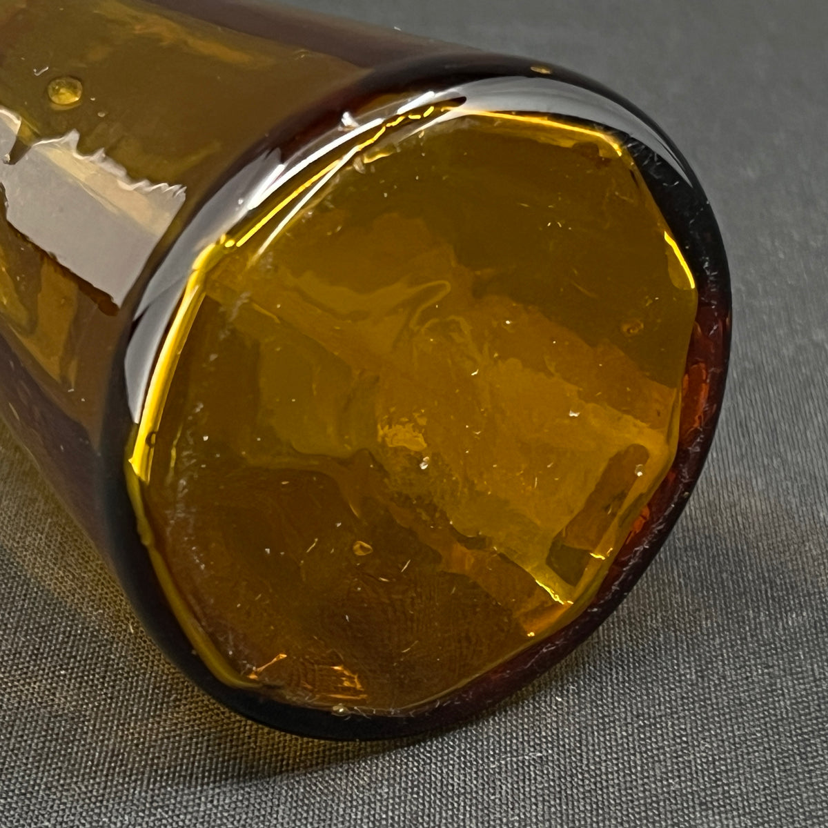 Amber tulip glass from Holmegaard Glasværk, heavy optics
