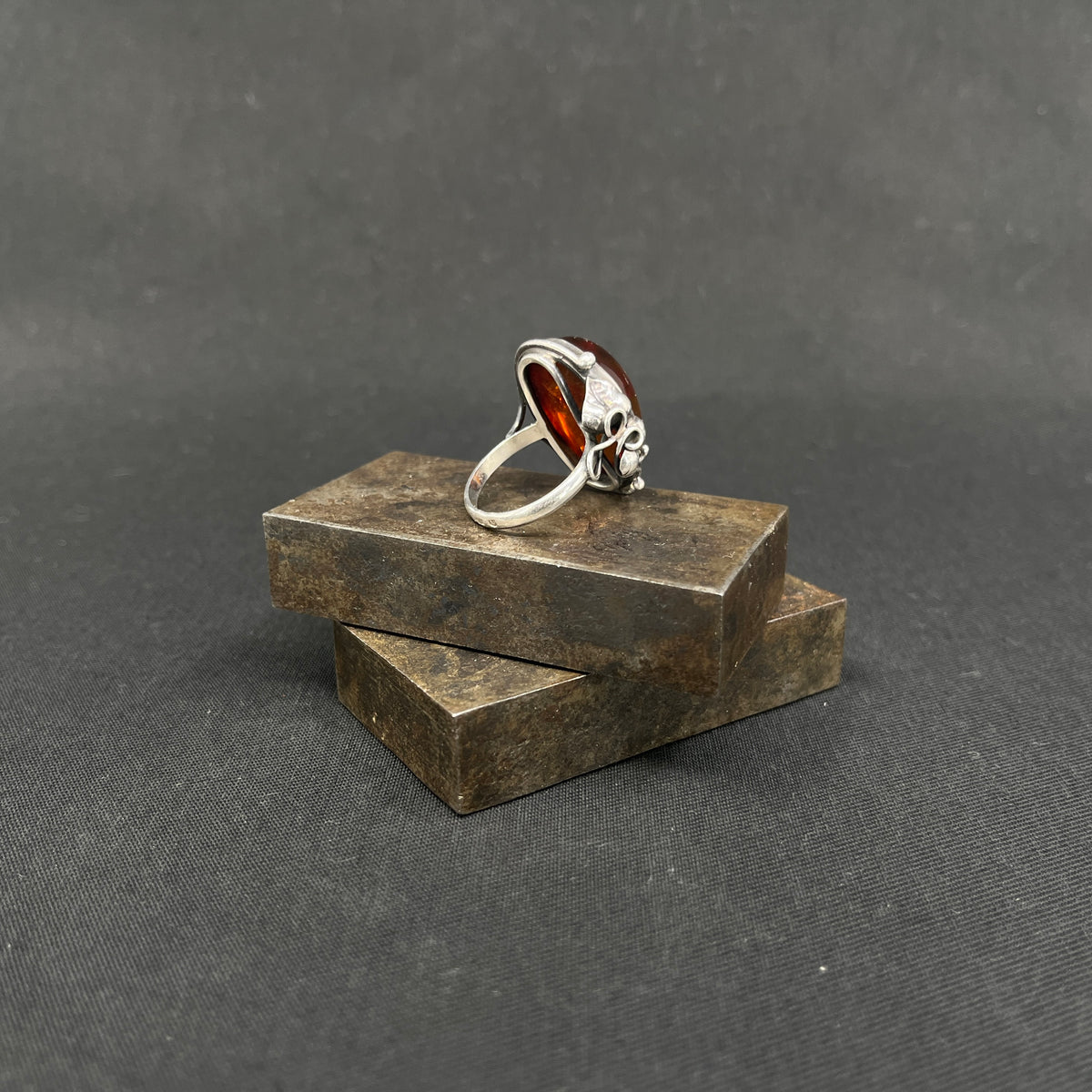 Ring with amber and flower