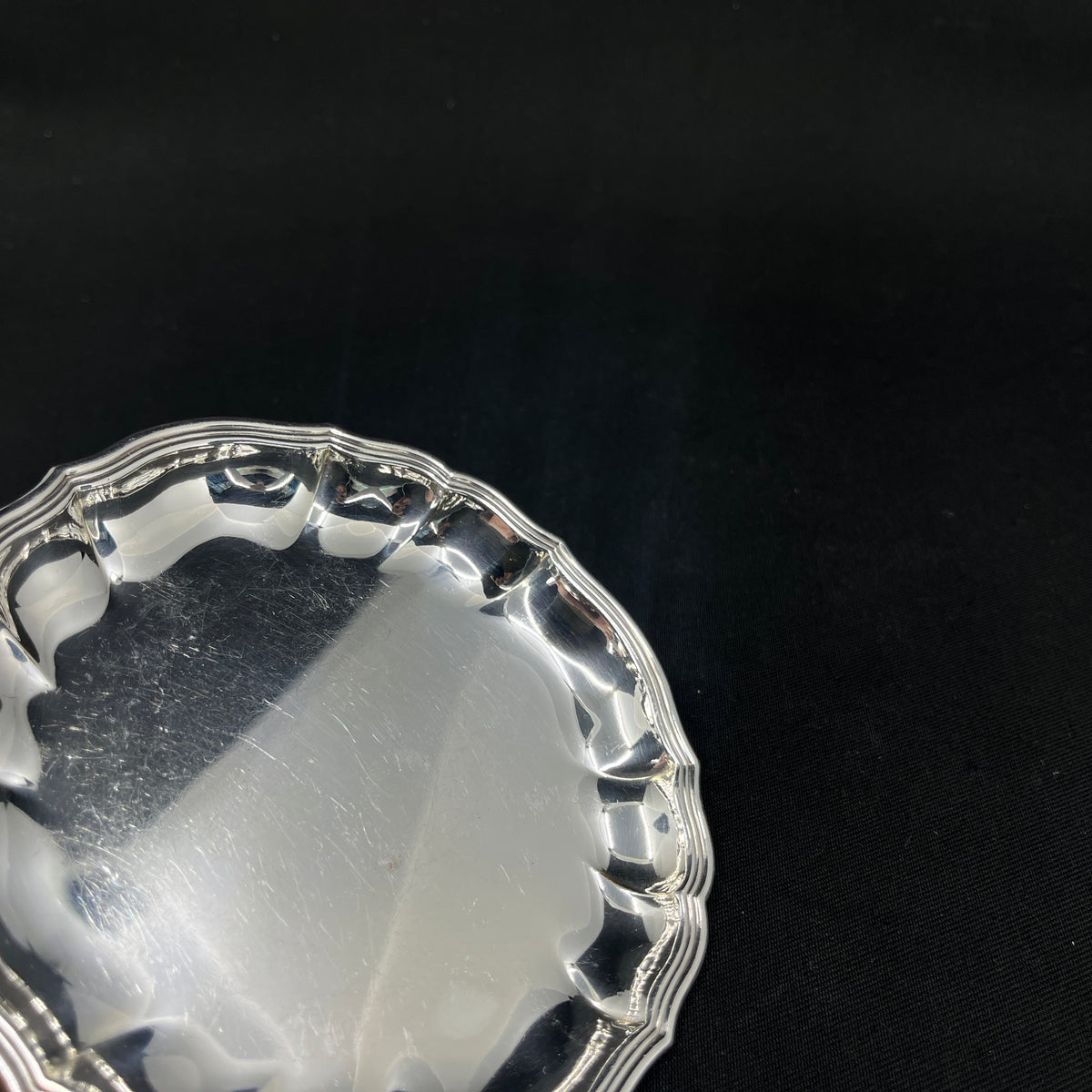 A pair of silver plated bottle trays