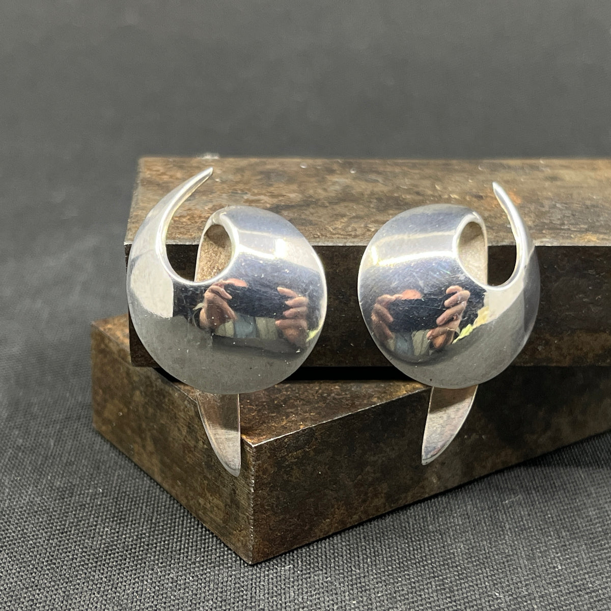 A pair of modern ear clips by N. E. From