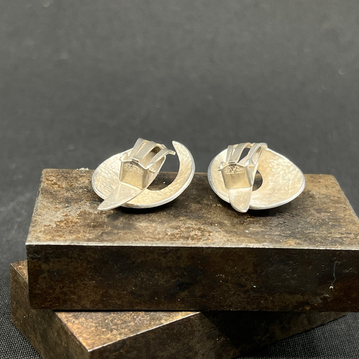 A pair of modern ear clips by N. E. From