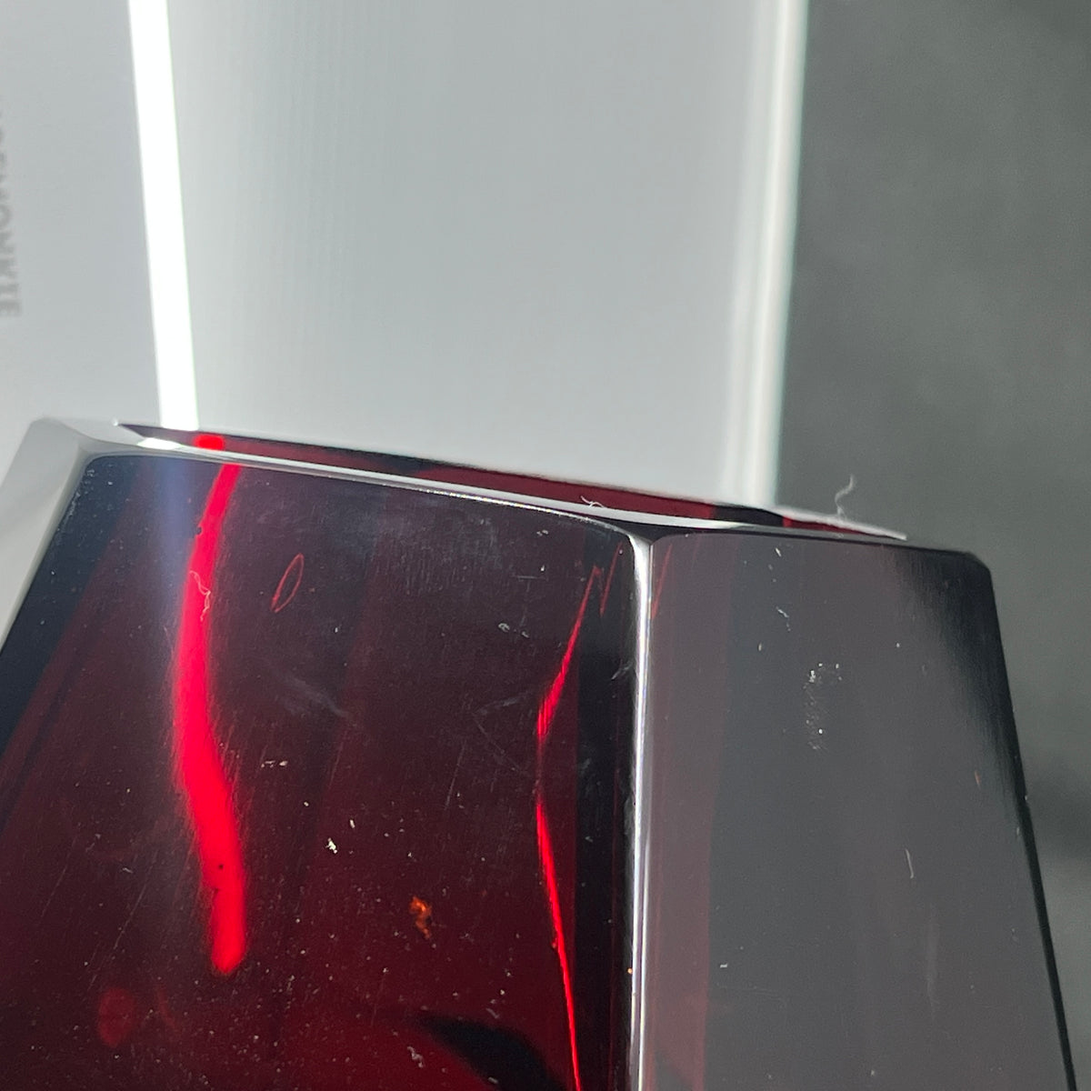 A pair of angular ruby red art deco vases