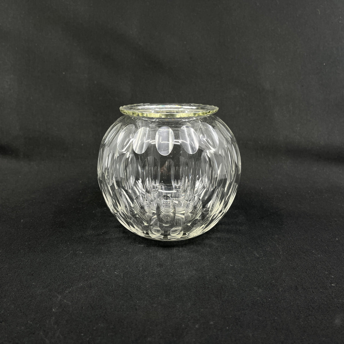 Spherical vase with olive carvings