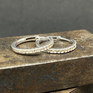 Stud earrings with clear stones