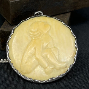 Bone pendant set in silver