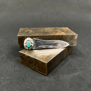 Silver bookmark with a green stone