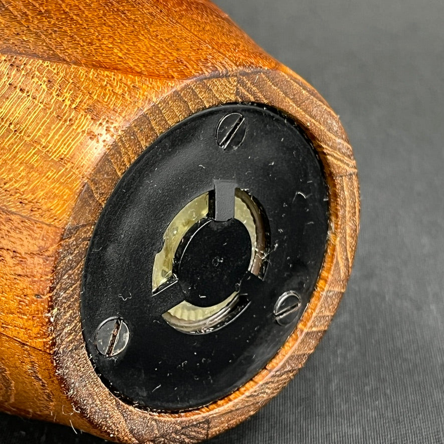 Modern pepper mill in teak