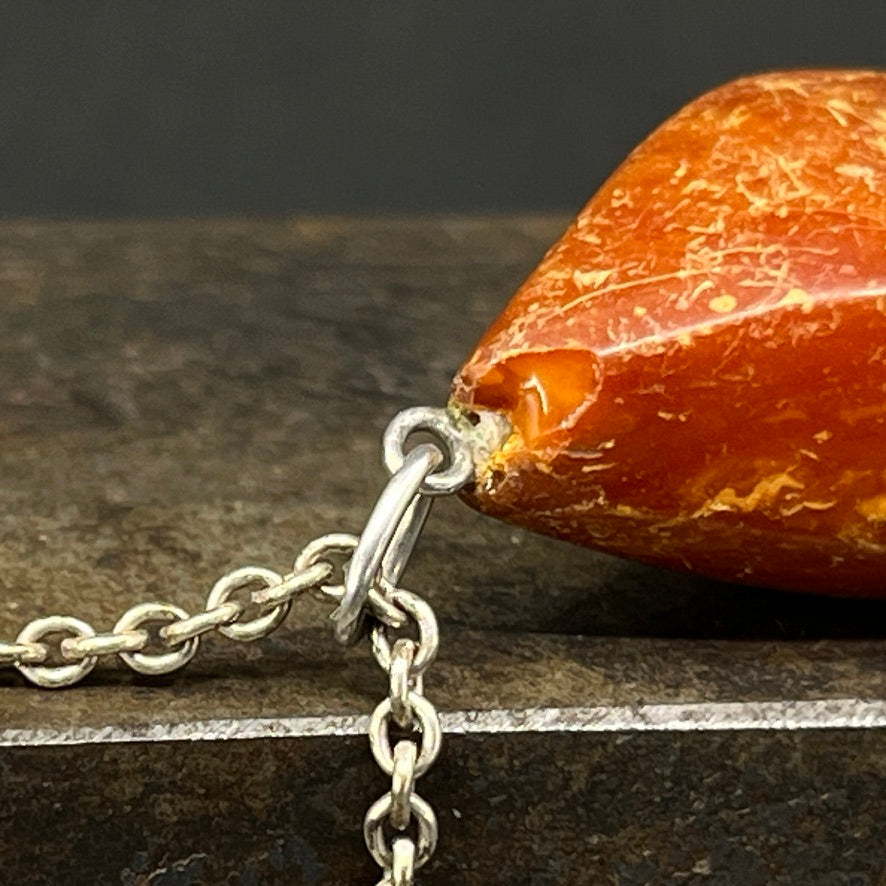 Necklace with amber pendant