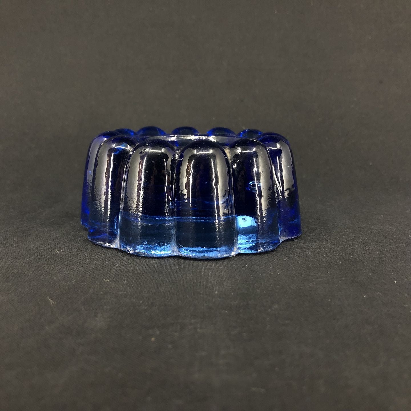 Piano stand in blue glass