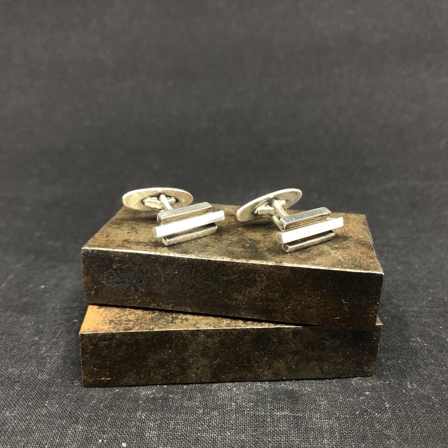 A pair of NE From cufflinks