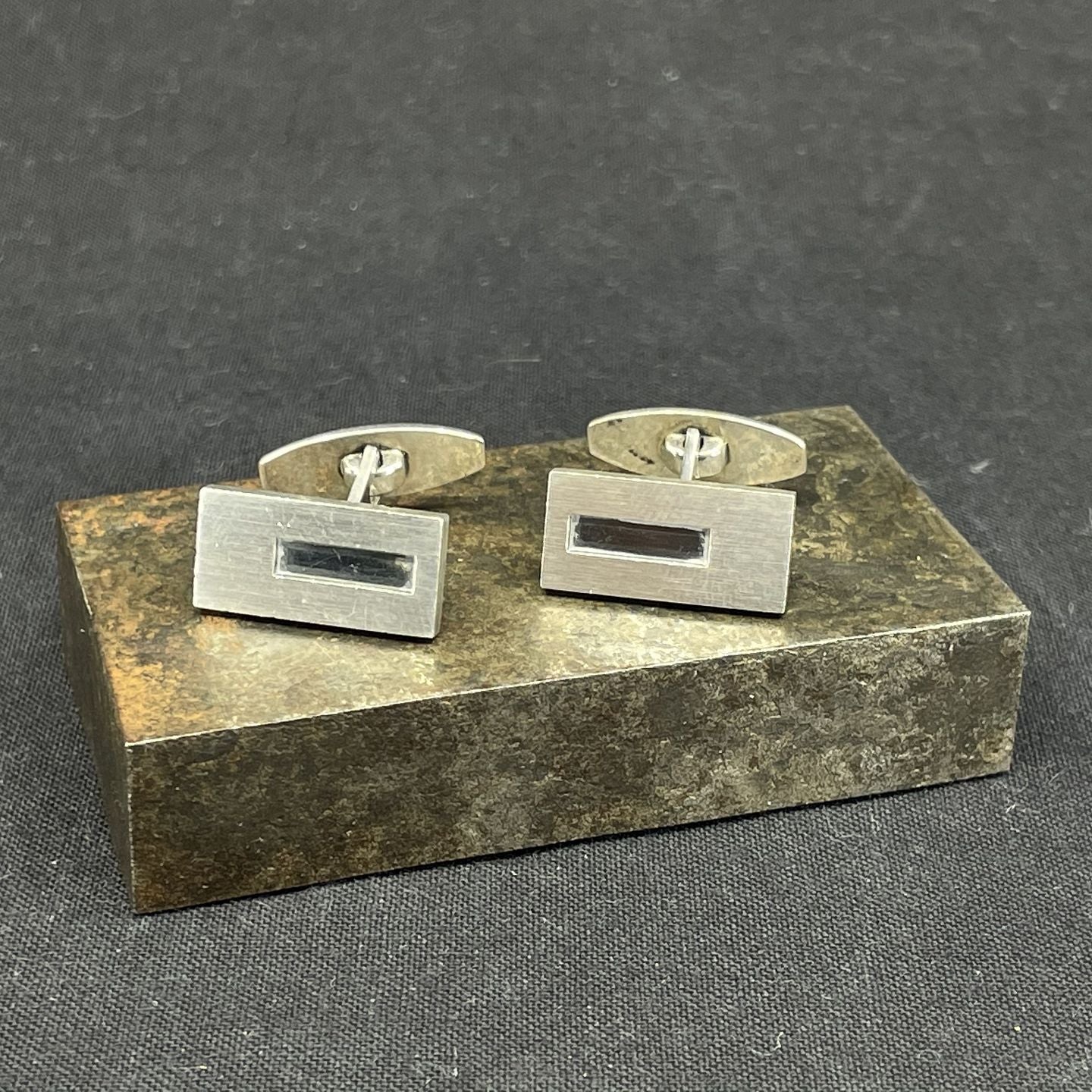 A pair of NE From cufflinks