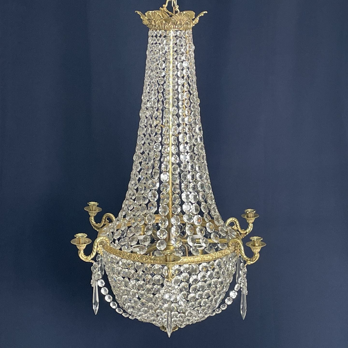 Fine old chandelier with gilded frame
