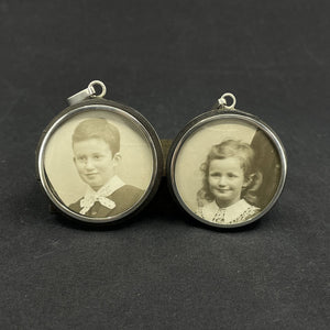 A pair of pendants with room for pictures