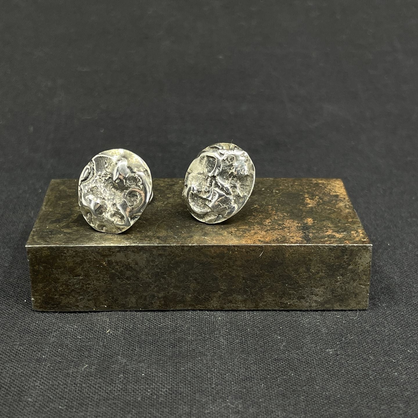 A pair of ear clips from the 1970s.