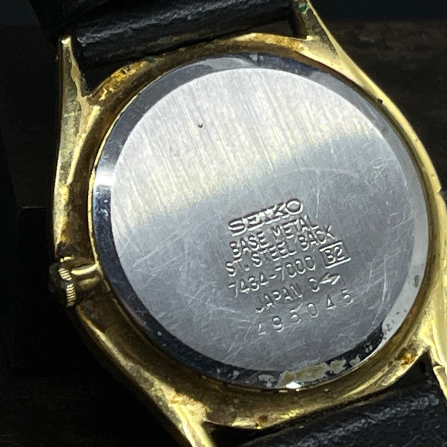 Seiko armbåndsur med gylden skive