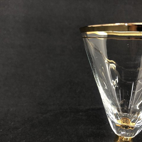 Ida med guld portvinsglas