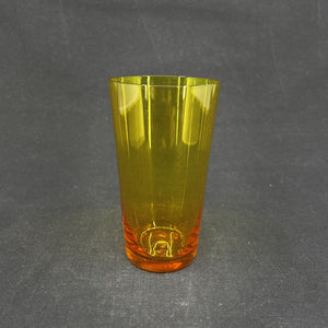 Gylden orange sodavandsglas fra Holmegaard