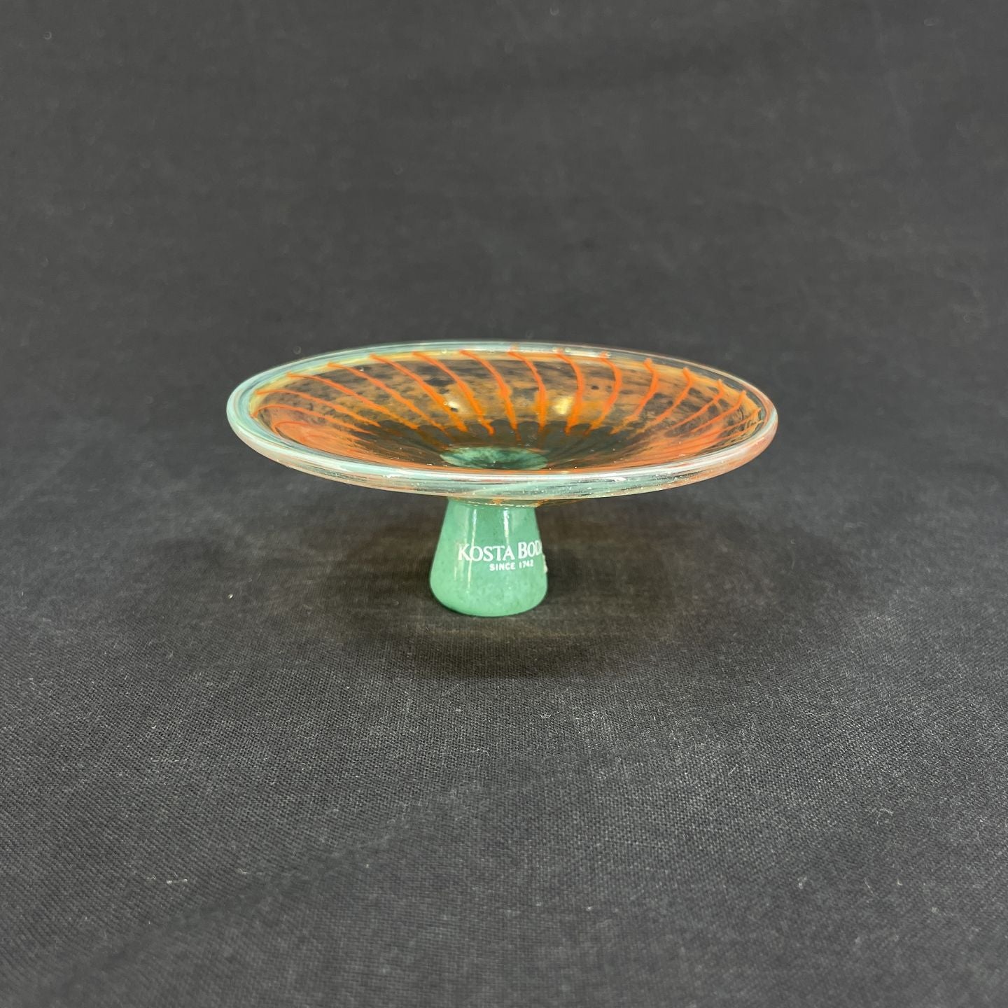 Orange miniature dish from Kosta Boda