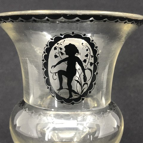 Antique vase with decoration of a child
