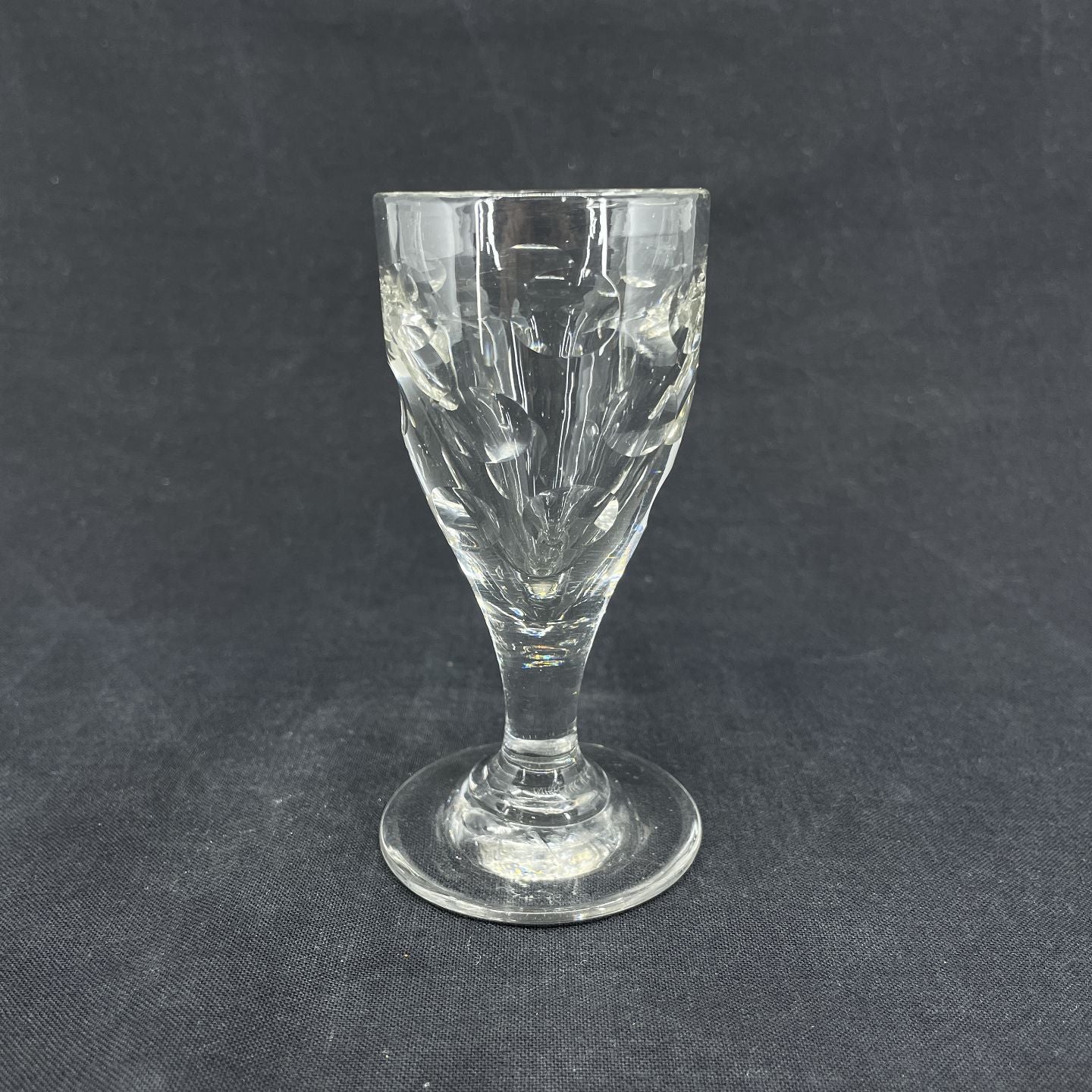 Cordial glass with eyes from the beginning of the 20th century